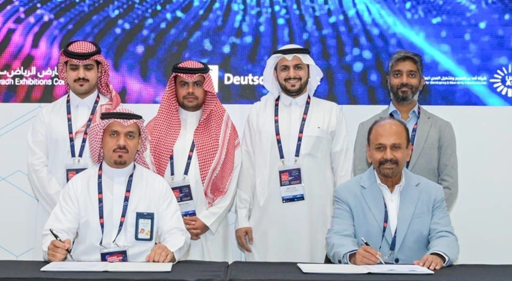 Rqeem and Torry Harris sign landmark