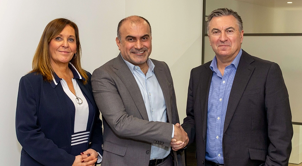 Nokia's Lorraine Twigg, Vice President of Global Strategic Partnerships and Kamal Ballout, Head of Enterprise and Partners for Network Infrastructure, with Westcon-Comstor CEO David Grant as they sign the MEA agreement