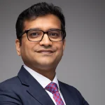 Naveen Kumar, Senior Associate Director, Janus Henderson